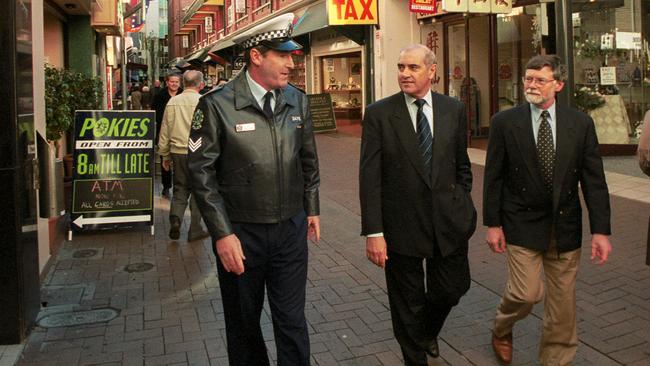 Then SA Police acting Senior Sergeant Paul Taggart with Premier John Olsen and Attorney-General Trevor Griffin in the Adelaide CBD in 2000.