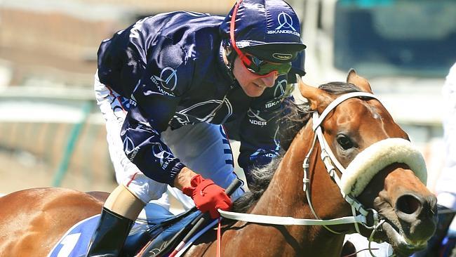 Jim Cassidy rides Zoustar to a win in the Coolmore Stud Stakes. Picture: Mark Evans