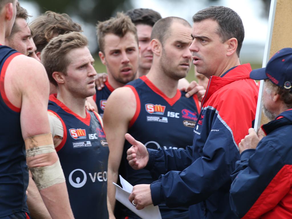 SANFL: Central District v Norwood at Elizabeth Oval. 11 August 2018. Norwood coach Jarrod Cotton addresses his players at three Quarter Time.;(AAP Image/Dean Martin)