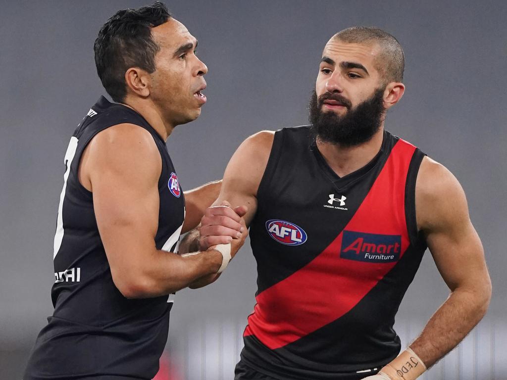 Eddie Betts with Adam Saad.