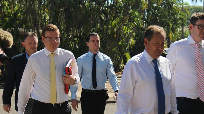 Zachary Rolfe (in a blue shirt) and his legal team arrive at the Supreme Court in Darwin ahead of his trial for the alleged murder of Yuendumu teenager Kumanjayi Walker. Picture: Jason Walls