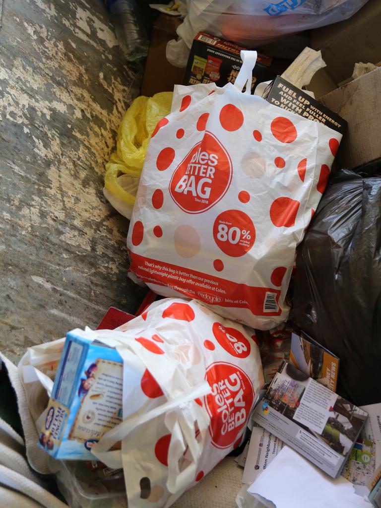 Plastic bag ban Coles Woolworths reusable bags thrown out