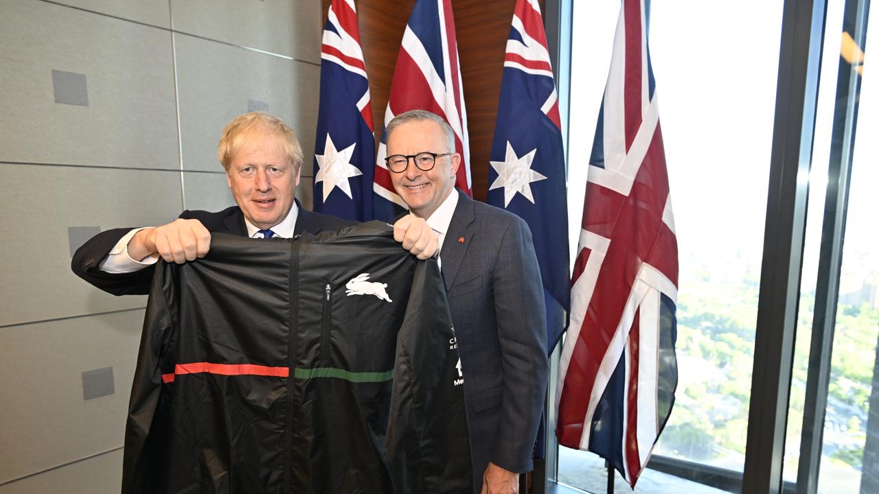 Prime Minister Anthony Albanese presented Boris Johnson with a jacket from his beloved South Sydney Rabbitohs NRL rugby league team at their meeting in Madrid.