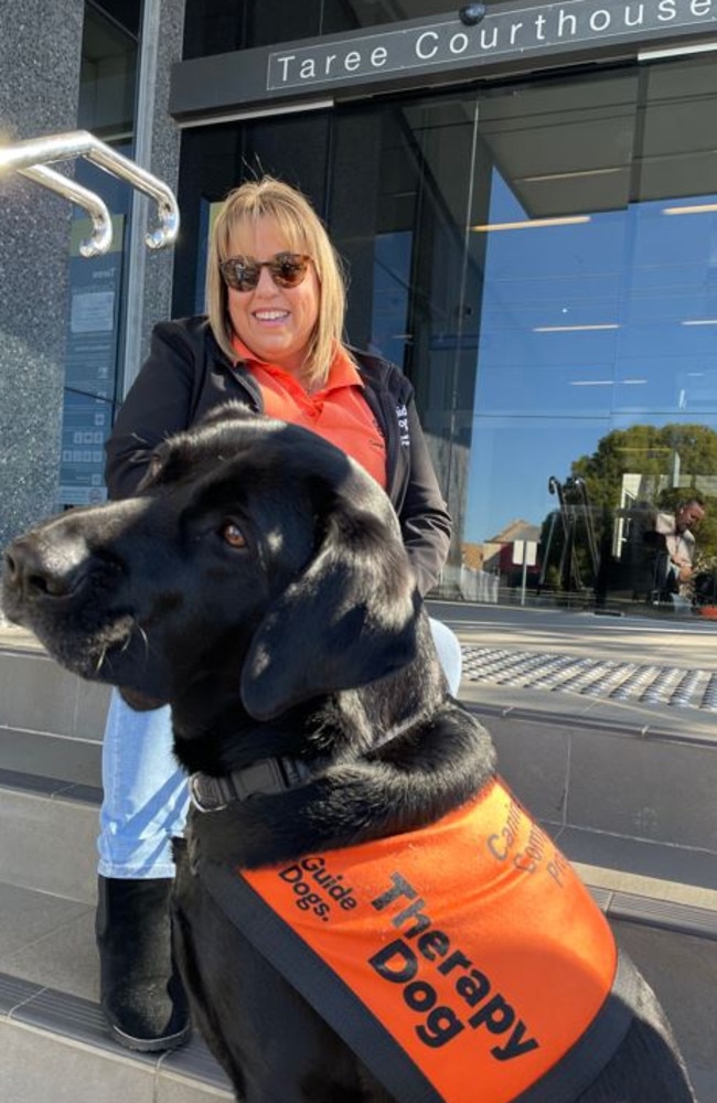 Ciara Knox and Dimitri the therapy dog are a calming presence at Taree Court House. Picture: Janine Watson.