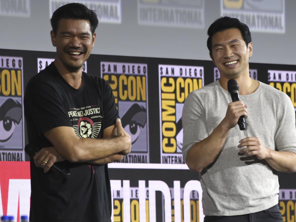 Destin Daniel Cretton, left, and Simu Liu speaking on the during the Marvel Studios panel at Comic-Con. Picture: Chris Pizzello/AP