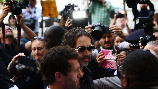 Russell Brand arrives at Westminster Magistrates' Court on May 2 in London where he faces charges related to accusations of rape, indecent assault and sexual assault between 1999 and 2005. Picture: Getty Images