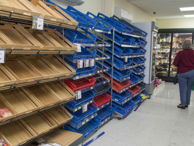Empty shelves in the bread aisle at the Four Square Hanmer Springs after the huge Earthquake. Picture: AP