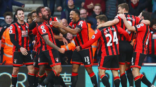 Bournemouth players celebrate Steve Cook’s goal against Liverpool at Vitality Stadium in Bournemouth.
