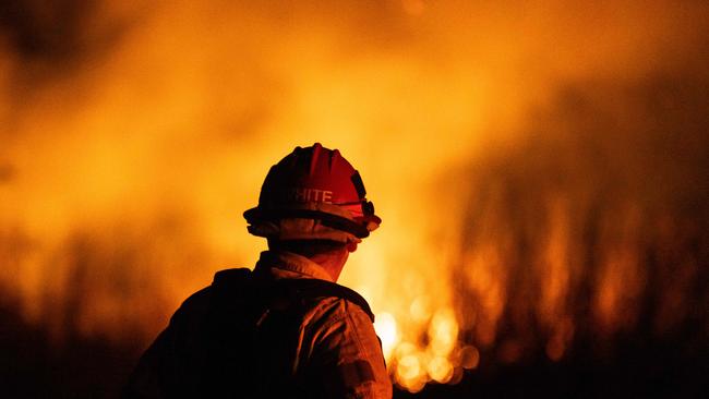 A firefighter monitors the spread of the Auto Fire in Oxnard, North West of Los Angeles, California, on January 13, 2025. Picture: Etienne Laurent/AFP