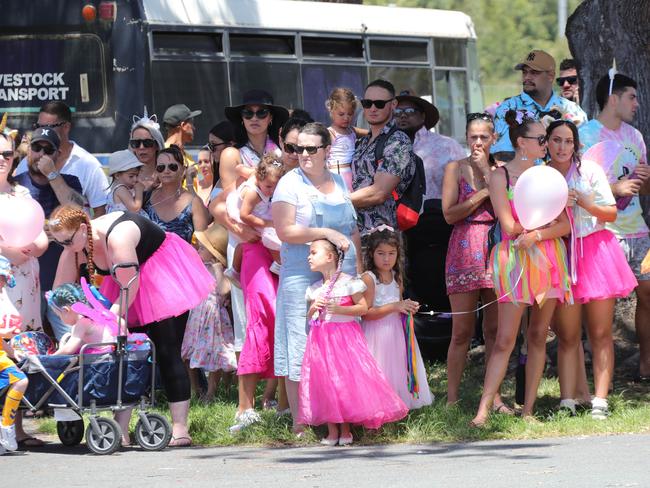 Mourners wear brightly coloured and fairy costumes. Picture: Glenn Hampson