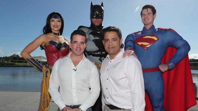 Village Roadshow CEO Clark Kirby and COO Bikash Randhawa with the Justice League at the announcement of the reopening. Picture Glenn Hampson