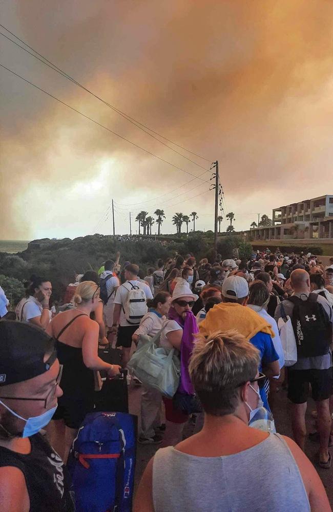 Tourists are evacuated from hotels during wildfires on the Greek island of Rhodes. Picture: Stringer / Eurokinissi / AFP