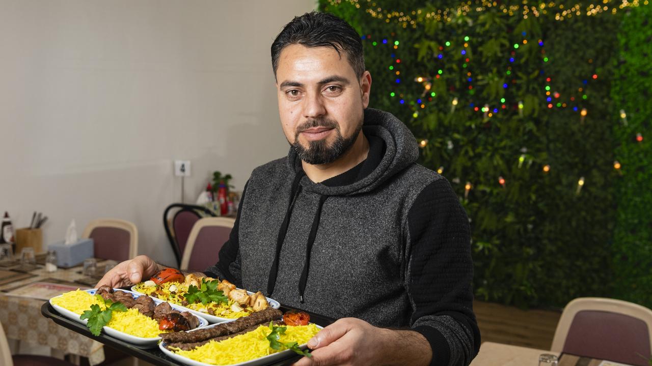 Toowoomba Shish Kebab owner Dalshad Zghla with a delicious meal in the Margaret St store, Wednesday, August 17, 2022. Picture: Kevin Farmer