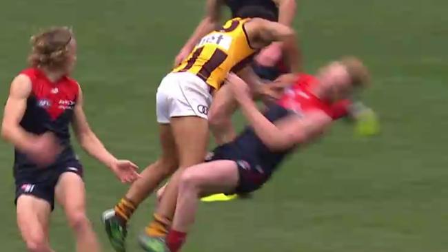 Cyril Rioli cleans up Clayton Oliver.