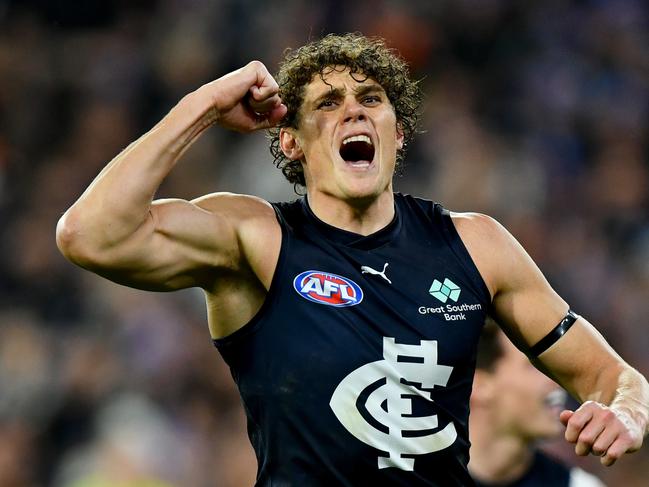 MELBOURNE, AUSTRALIA – JUNE 09: Charlie Curnow of the Blues celebrates kicking a goal during the round 13 AFL match between Essendon Bombers and Carlton Blues at Melbourne Cricket Ground, on June 09, 2024, in Melbourne, Australia. (Photo by Josh Chadwick/Getty Images)