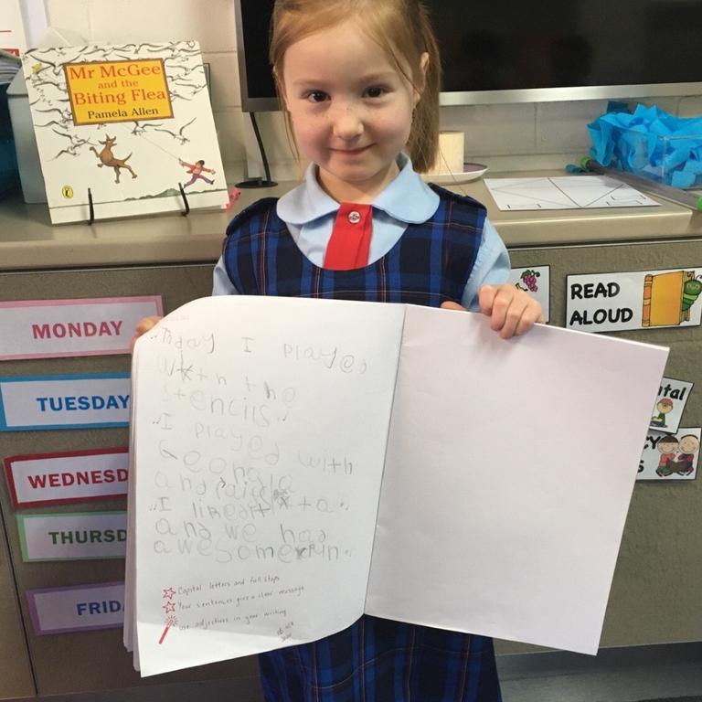 Olivia is back at school and wrote her first long sentence this week but her first year of school has been completely disrupted. Picture: Supplied.