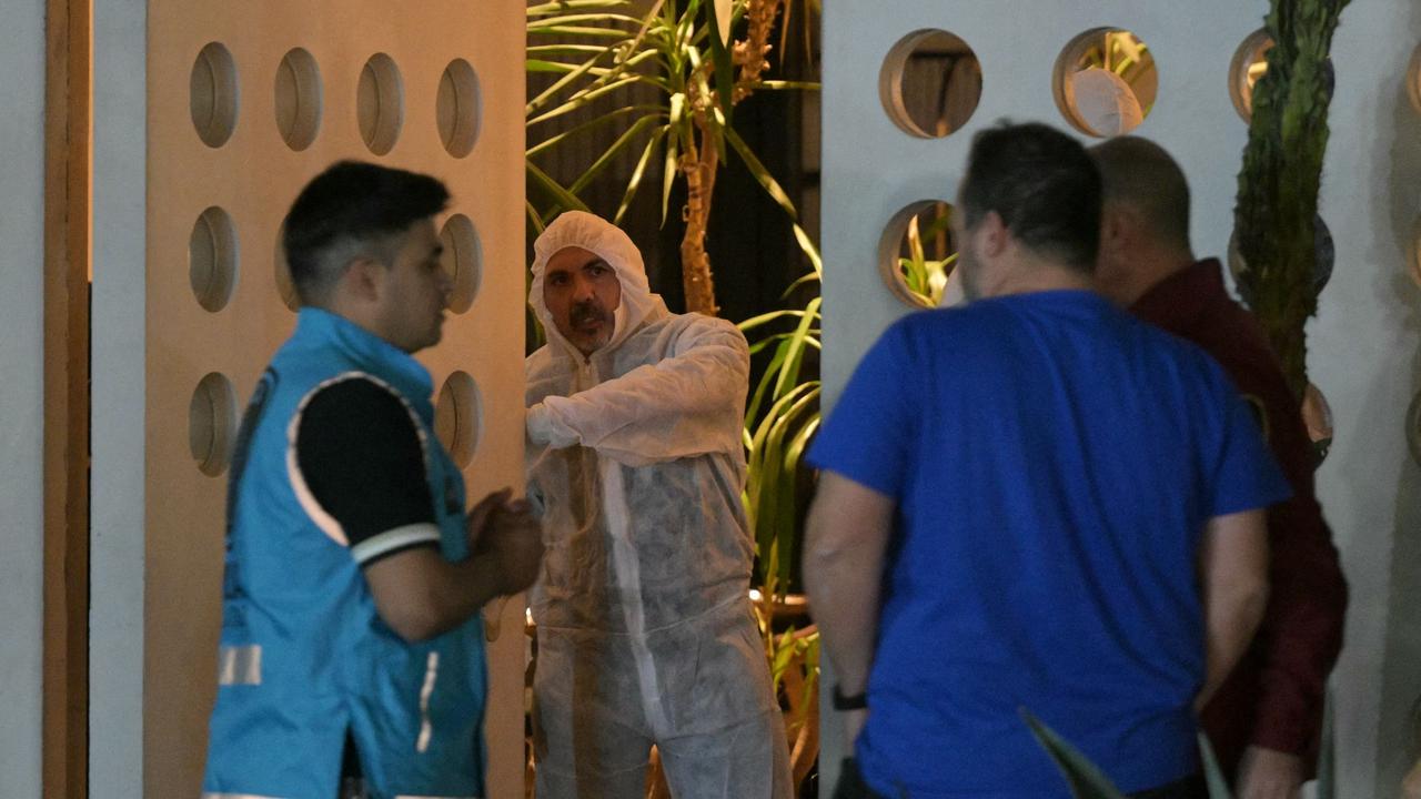 A forensic worker was seen entering CasaSur Palermo hotel. Picture: Juan Mabromata/AFP