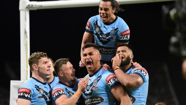 TOWNSVILLE, AUSTRALIA - JUNE 09:  Daniel Saifiti of the Blues celebrates with team mates after scoring a try during game one of the 2021 State of Origin series between the New South Wales Blues and the Queensland Maroons at Queensland Country Bank Stadium on June 09, 2021 in Townsville, Australia. (Photo by Ian Hitchcock/Getty Images)