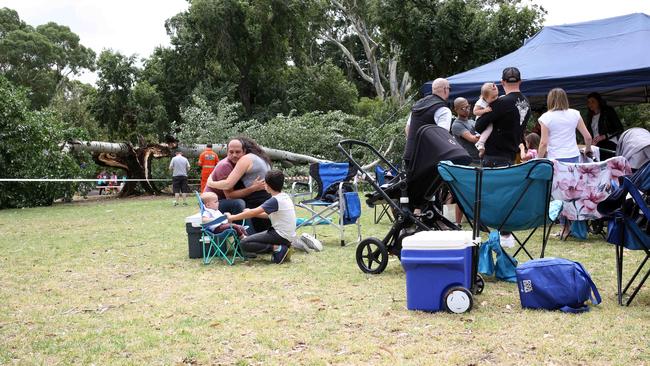 Party-goers hug after the incident. Picture: AAP/Emma Brasier