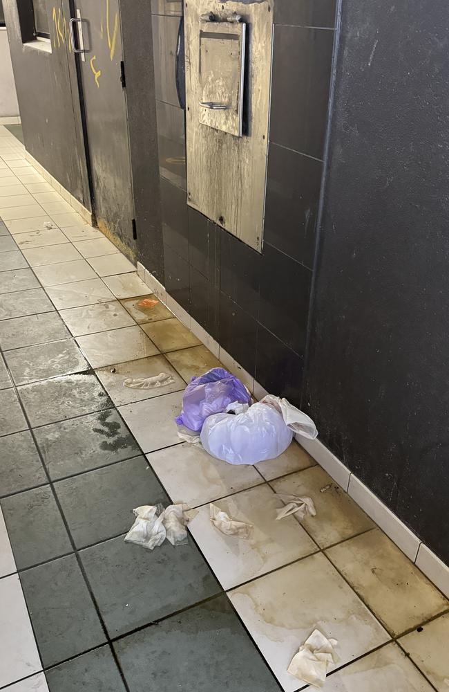 Some residents left their waste on the floor below the rubbish chute.