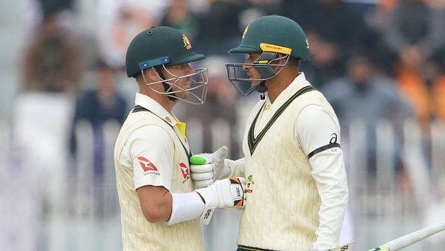 Warner and Khawaja will walk to the crease together in Warner’s 100th Test match. (Photo by Farooq NAEEM / AFP)