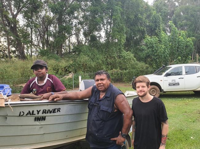 Andrew Casey, Mark Casey and Diego Pianalto with the boat they took down the Daly River. Picture: Supplied