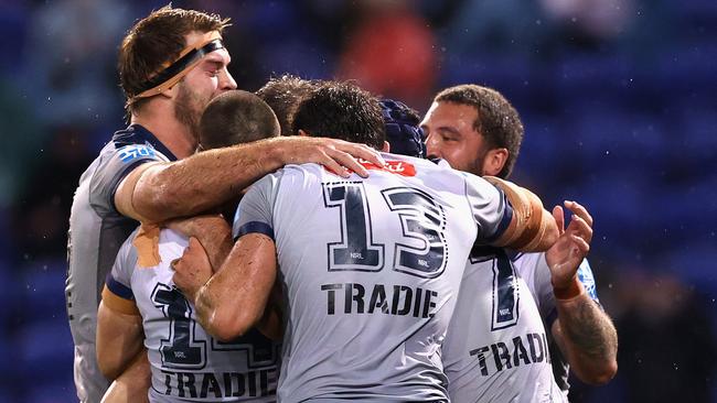 NEWCASTLE, AUSTRALIA - JULY 01: Melbourne Storm celebrate a try during the round 16 NRL match between the Sydney Roosters and the Melbourne Storm at McDonald Jones Stadium, on July 01, 2021, in Newcastle, Australia. (Photo by Ashley Feder/Getty Images)