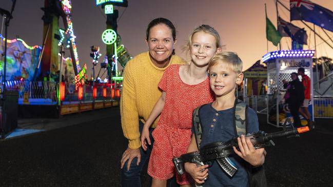 Belinda Bill with daughter Matilda Bill and son Lawson Bill enjoying sideshow alley at the Toowoomba Royal Show, Thursday, March 30, 2023. Picture: Kevin Farmer