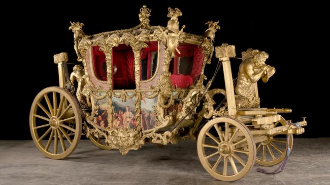 The Gold State Coach, a reproduction inspired by the 1760 commission by Francis Rawdon-Hastings, 1st Marquess of Hastings for King George III, and designed by Sir William Chambers, to be sold at The Crown auction. Picture: Bonhams