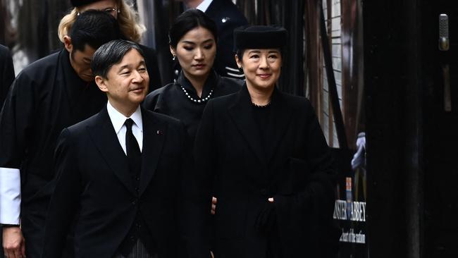 Japan's Emperor Naruhito and his wife Empress Masako arrive at Westminster Abbey in London on September 19, 2022, for the State Funeral Service for Britain's Queen Elizabeth II. (Photo by Marco BERTORELLO / AFP)