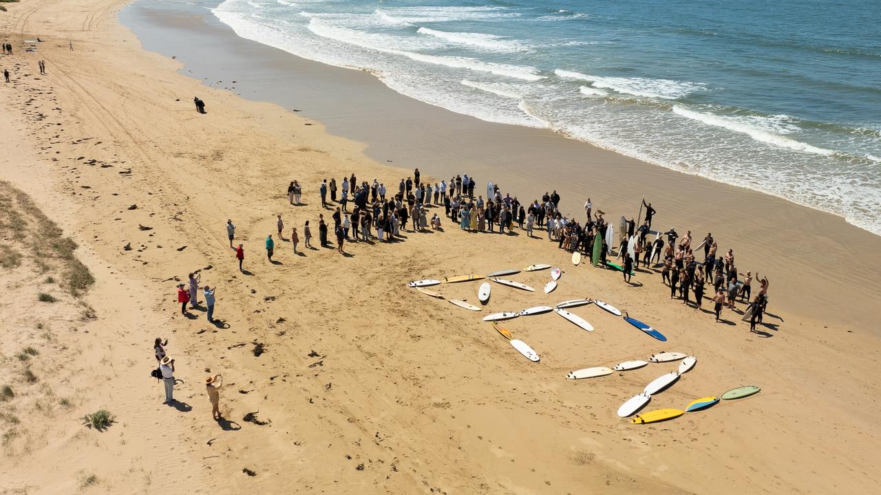 About 200 people gathered to say farewell to the “one of a kind” surfer. Picture: supplied/Peter James Photography/Adam Stan Photography