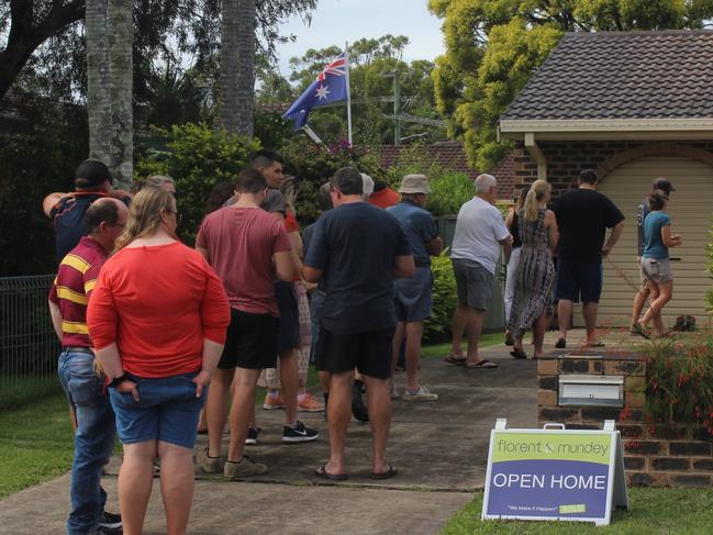 House hunters queue outside a home in Robert Garrett St, Coffs Harbour. With few houses on the market and a growing number of people looking to relocate to the region, prices are rising as people look to outbid one another. Photo: Tim Jarrett