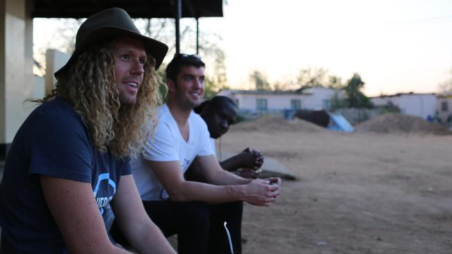 Shocking stats ... Dustin Leonard with Tim Dormer in Botswana, on a mission to distribute half a million free condoms. Picture: Supplied