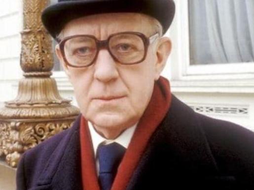 Alec Guinness as George Smiley.