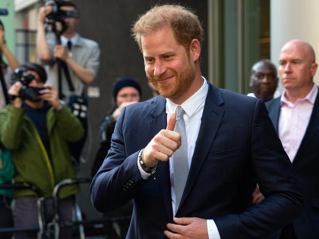 LONDON, ENGLAND - JUNE 7: Prince Harry, Duke of Sussex, gives a thumbs up as he leaves after giving evidence at the Mirror Group Phone hacking trial at the Rolls Building at High Court on June 7, 2023 in London, England. Prince Harry is one of several claimants in a lawsuit against Mirror Group Newspapers related to allegations of unlawful information gathering in previous decades. (Photo by Carl Court/Getty Images)