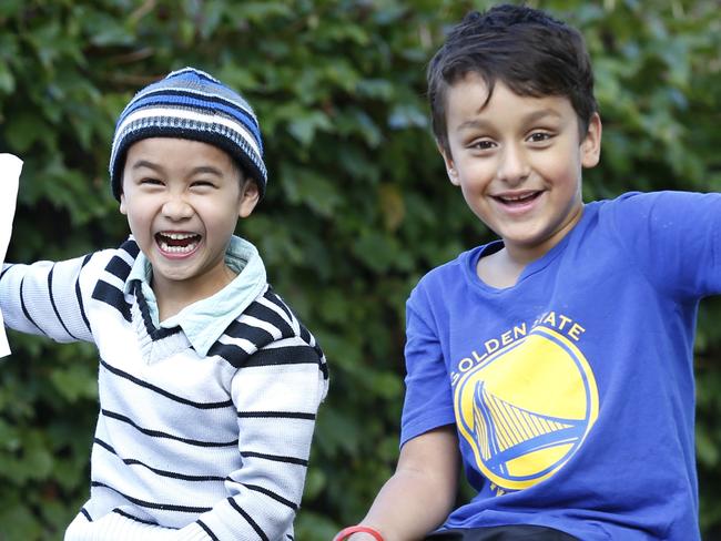 Corona package for Friday. Alfred 7, is writing his friends letters and putting them in their mailboxes and then waiting for them to 'post' their letters back. Alfred  7, with his friend Sam 7, have a laugh reading each others letters.    Picture: David Caird