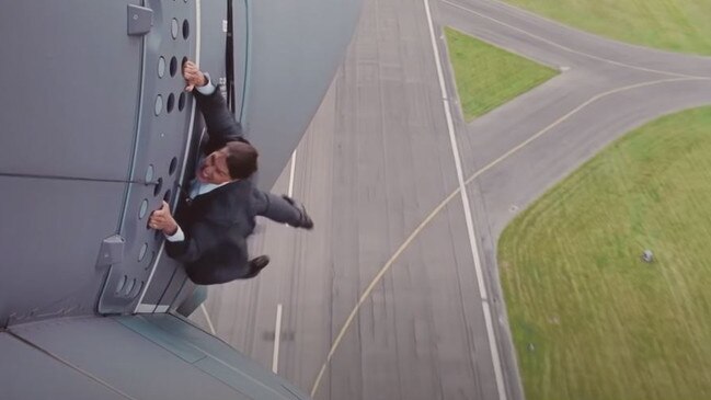 Tom Cruise strapped to the side of an Airbus.