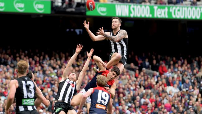 Jeremy Howe marks over Christian Petracca.