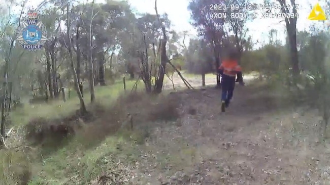 Officers spotted the man allegedly leaving the scene, holding a shovel, on Tuesday in bushland in the Mandurah suburb of Stake Hill. Picture: Supplied / WA Police