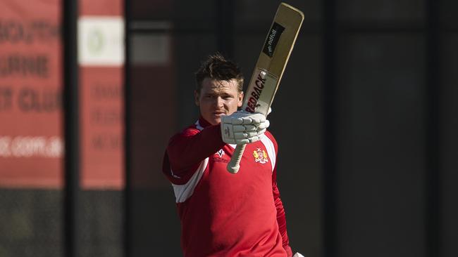 Jordan Wyatt raises his bat. Pic: C M Thomas Photography