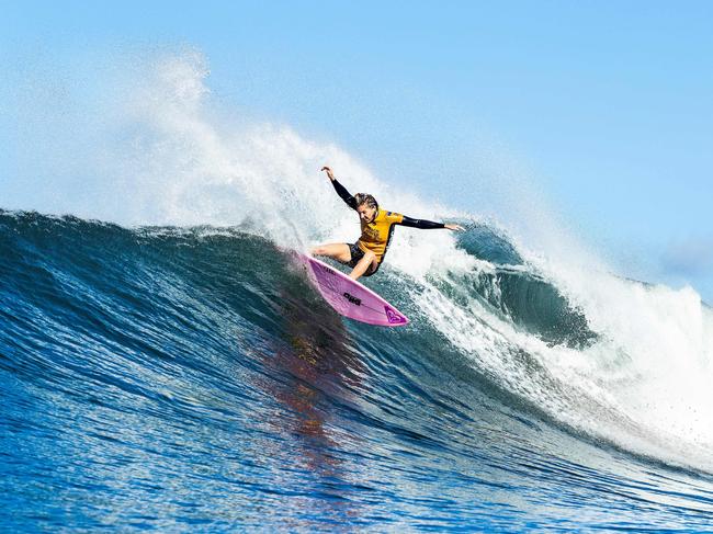 TOPSHOT - Surfing World Champion Stephanie Gilmore from Australia advances to the Semifinals of the 2018 Beachwaver Maui Pro after winning Quarterfinal Heat 2 at Honolua Bay, Maui, Hawaii, on November 27, 2018. - Gilmore was confirmed as world champion at the season-ending Maui Pro when her only challenger, the American Lakey Peterson, failed to progress past the early stages of the event. (Photo by Kelly Cestari / www.worldsurfleague.com / AFP) / RESTRICTED TO EDITORIAL USE - MANDATORY CREDIT "WSL/ Kelly CESTARI " - NO MARKETING - NO ADVERTISING CAMPAIGNS - DISTRIBUTED AS A SERVICE TO CLIENTS