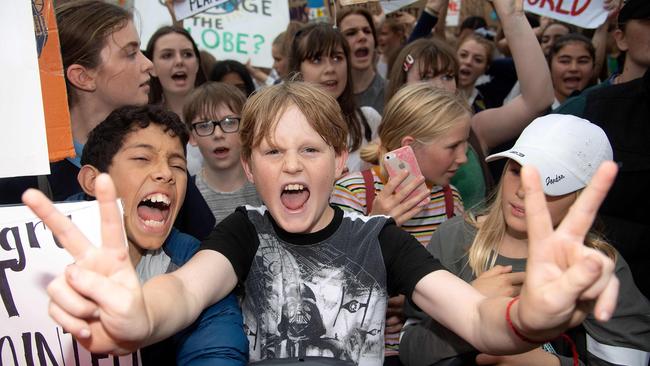 School children protest at Parliament during a strike and protest by students highlighting inadequate progress to address climate change at Parliament grounds in Wellington on March 15, 2019. (Photo by Marty MELVILLE / AFP)