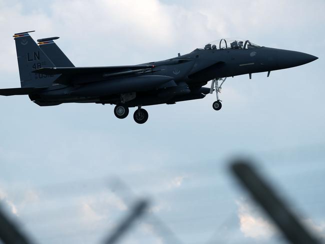 A US Air Force (USAF) F-15E Strike Eagle fighter jet, is pictured as it prepares to land at RAF (Royal Air Force) Lakenheath, east of England. Picture: AFP