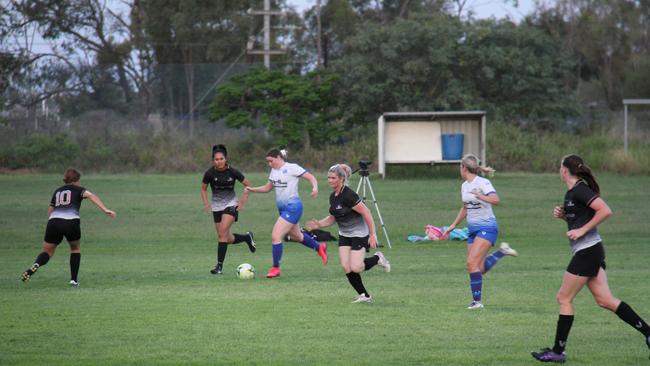 The Bluebirds and Central FC battle for possession in the inaugural CQ Women's Premier League match at Brian Niven Park. Central FC won the game 6 - 3.
