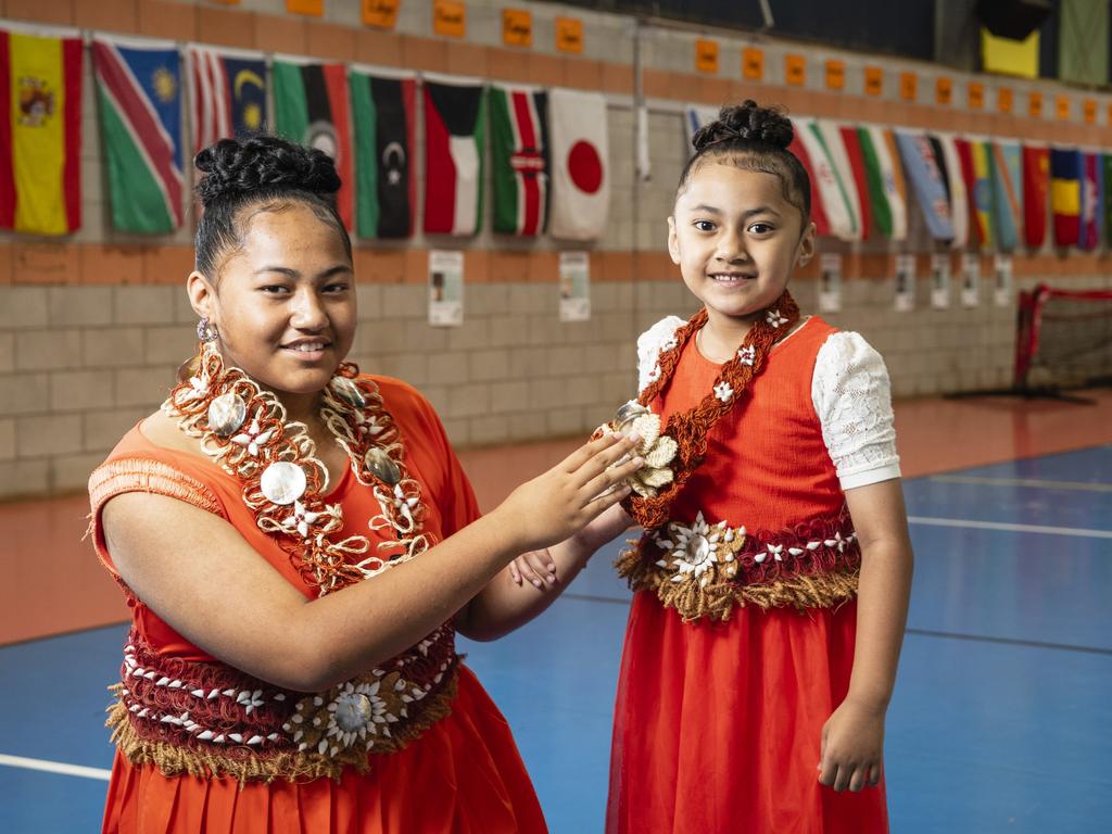 Sisters Tapaita (Yr1) and Hifo (Yr6) Leaaemanu represent Tonga at Harmony Day celebrations at Darling Heights State School. Picture: Kevin Farmer