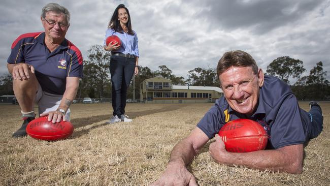 Dodges Ferry Football Club president David Bellars, left, Prosser MLC Jane Howlett and grounds co-ordinator Phil Hammer celebrate a grant that will let the water flow to maintain the club’s oval. Picture: EDDIE SAFARIK