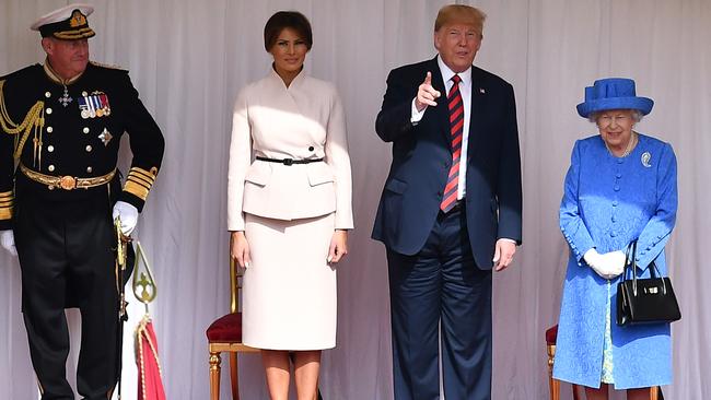 US First Lady Melania Trump with President Trump and the Queen in the quadrangle during a ceremonial welcome. Picture: Getty