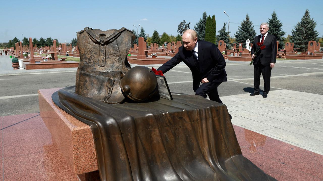 Putin visits the City of Angels memorial cemetery in Beslan for the first time since the 2004 killing of more than 330 people in a hostage siege. Picture: Vyacheslav Prokofyev/Pool/AFP