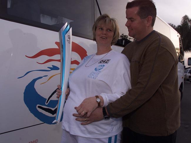 Olympic Torch Relay Day 89: September 04, 2000, Penrith to Bowral. A very pregnant Casandra Stewart and her husband Paul before her chance to run. Picture: Glen Campbell