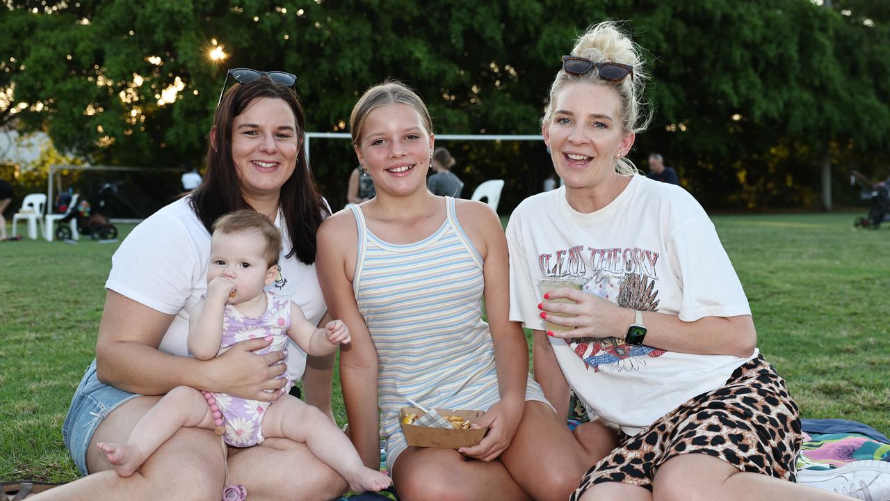 Kerrie Wood, Poppy Wood, 8 months, Maddi Murphy, 12, and Claire Murphy at the Barron River Food Festival, held at the Stratford Dolphins Football Club. Picture: Brendan Radke